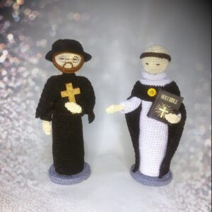 crochet dolls of St Damien & St Thomas Aquinas