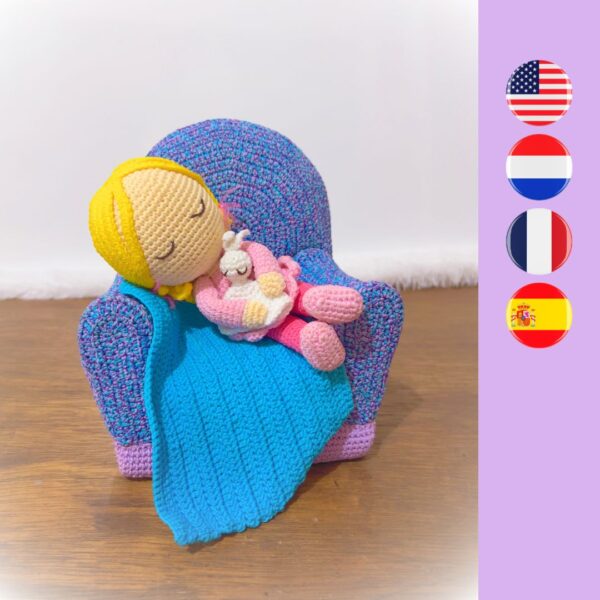 crochet girl on crochet sofa with crochet blanket and lovey