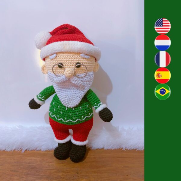 crochet Santa with green sweater on