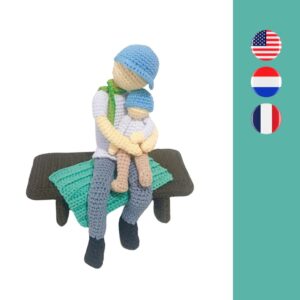 crochet father with child and blanket on bench