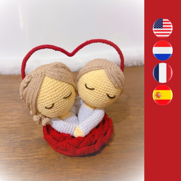 crochet Valentine's Day couple coming out of crochet rose with heart