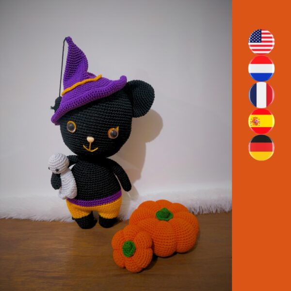 crochet Halloween cat with crochet ghost and crochet pumpkins