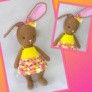 a crochet easter bunny in yellow and pink dress