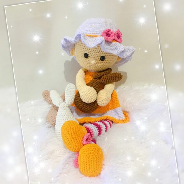 crochet Lola doll with small Easter Bunnies