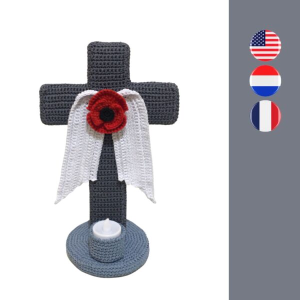 crochet cross with crochet angel guardian wings and crochet poppy