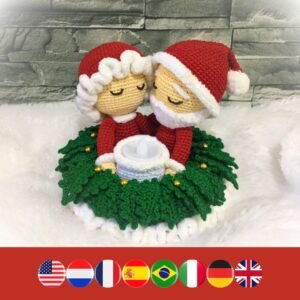 crochet Santa Claus with Mrs Claus, standing in a crochet Christmas wreath
