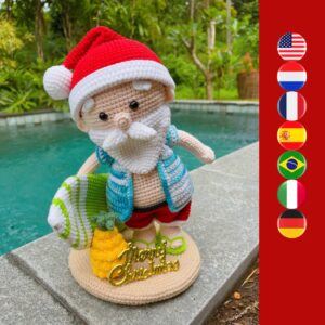 crochet tropical Santa with crochet surfboard and pineapple