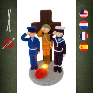 knitted soldiers in front of knitted cross with knitted poppy