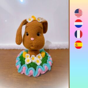 crochet Easter bunny head with daisy flowers, grass, ruffles and Easter eggs