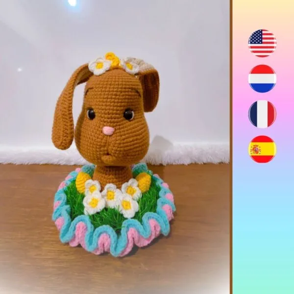 crochet Easter bunny head with daisy flowers, grass, ruffles and Easter eggs