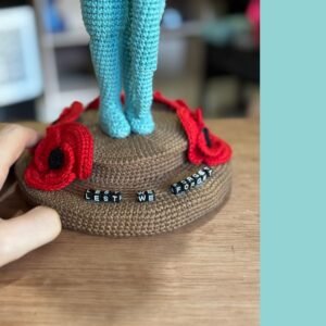 crochet soldier monument with poppies