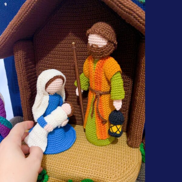 crochet nativity set with holy family, palm tree, 3 wise men, star and stable