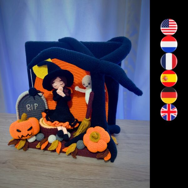 crochet halloween lady doll with crochet tree, gravestone, pumpkins, leaves, broom, moon, rocks and a ghost