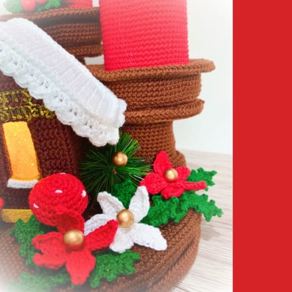 crochet Christmas candles with crochet poinsettia, gingerbread house, holly leaves and mushrooms