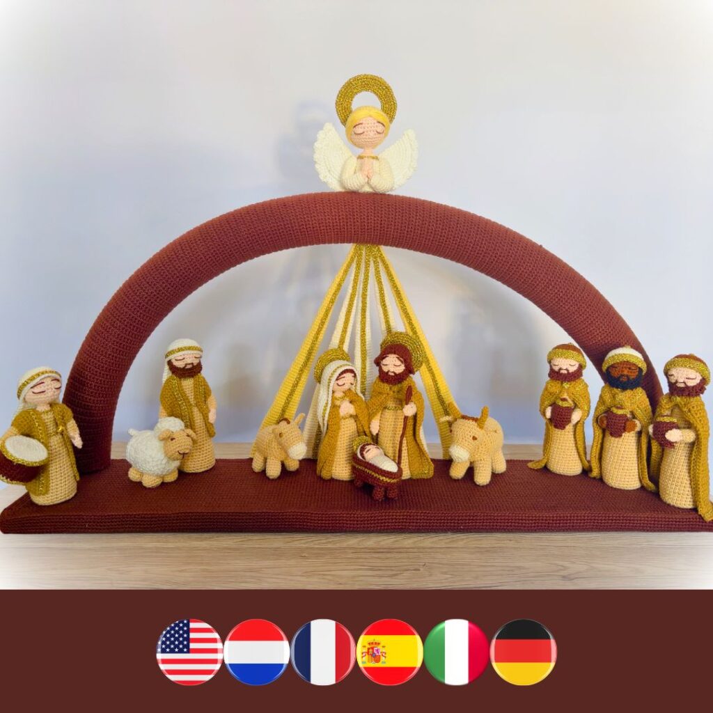 crochet nativity scene with Virgin Mary, Joseph, Jesus, ox, donkey, three wise men, shepherd, sheep, drummer boy, angle and an arch